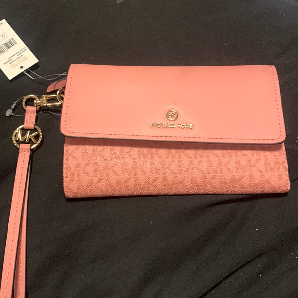 Brand new Michael kors jet set charm wristlet